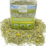 Heuland alpehø med morgenfrue og kamille